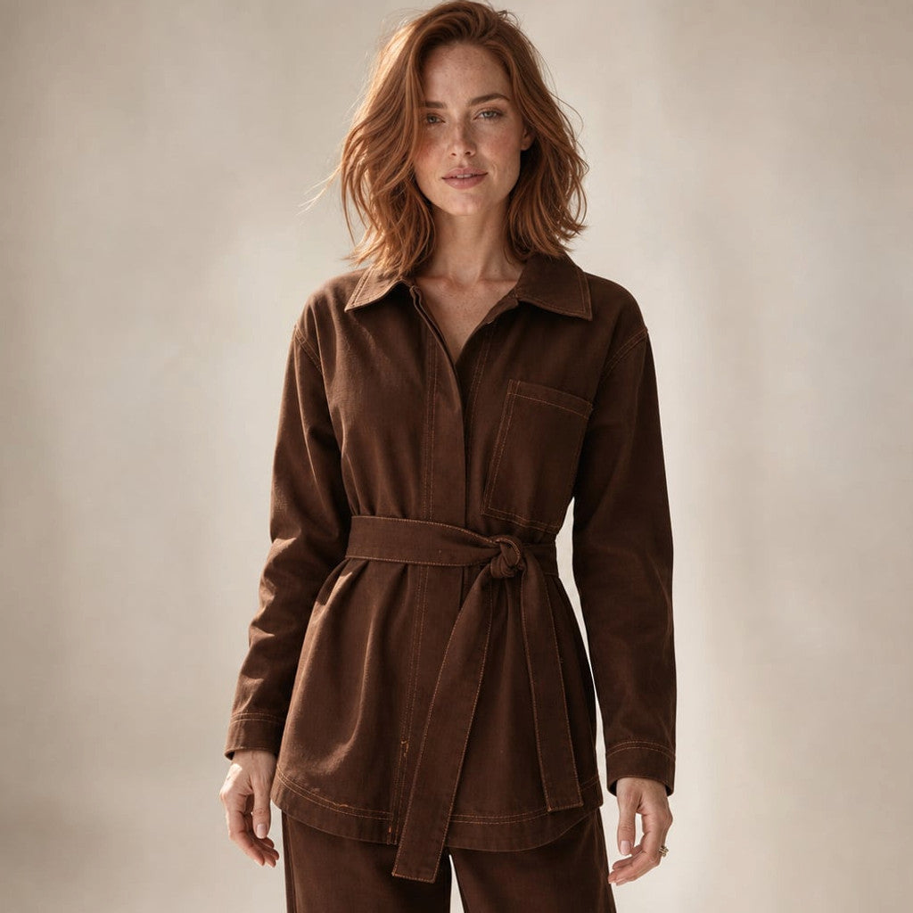Amy longline chocolate denim top with adjustable waist tie and collared V-neckline, front view