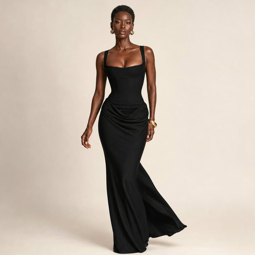 Rysa backless bodycon maxi dress in black, showing clean open-back detail from neckline to lower back, floor-length silhouette