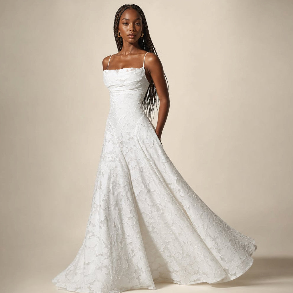 Model wearing Sledyn White floral maxi dress, full-length front view showing bodice fit and skirt sweep