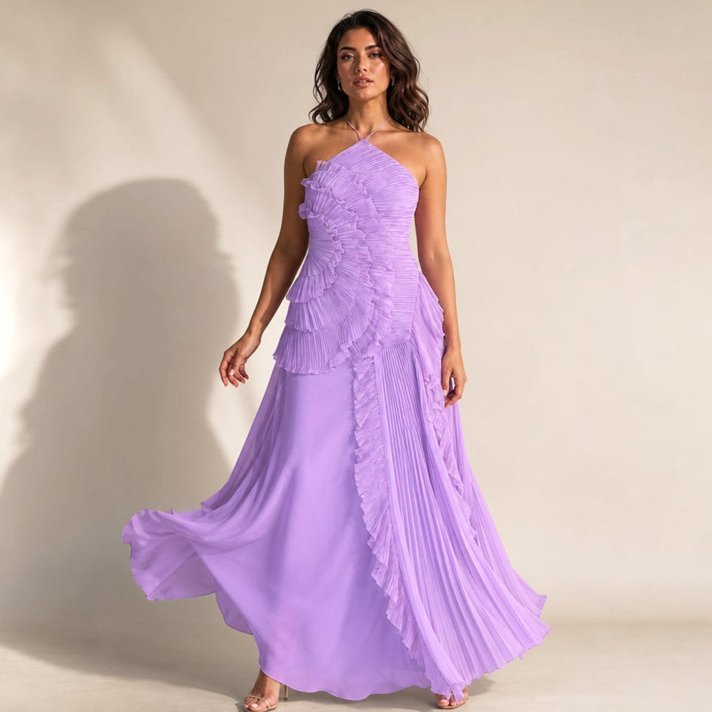 Model wearing purple pleated ruffle halter maxi dress with bare shoulders, full-length silhouette
