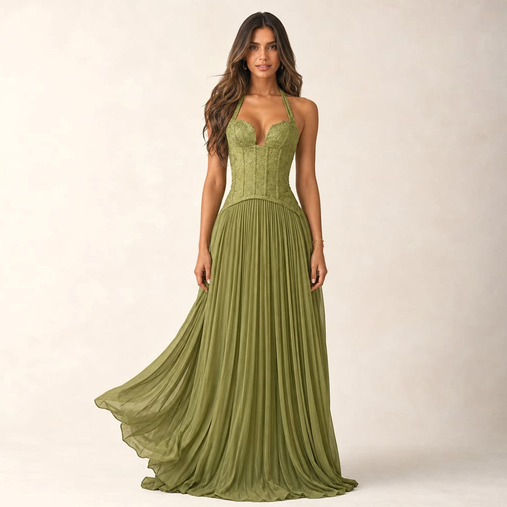 Aelva pleated corset maxi dress in rich green with boned bodice and full-length sweeping pleated skirt