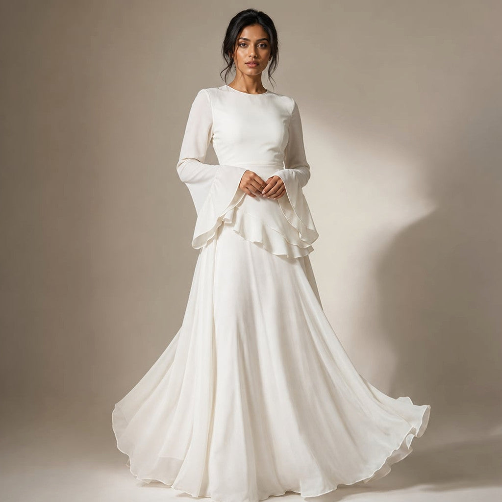 Model wearing white ruffle-sleeve maxi dress with fitted bodice and full-length flared skirt