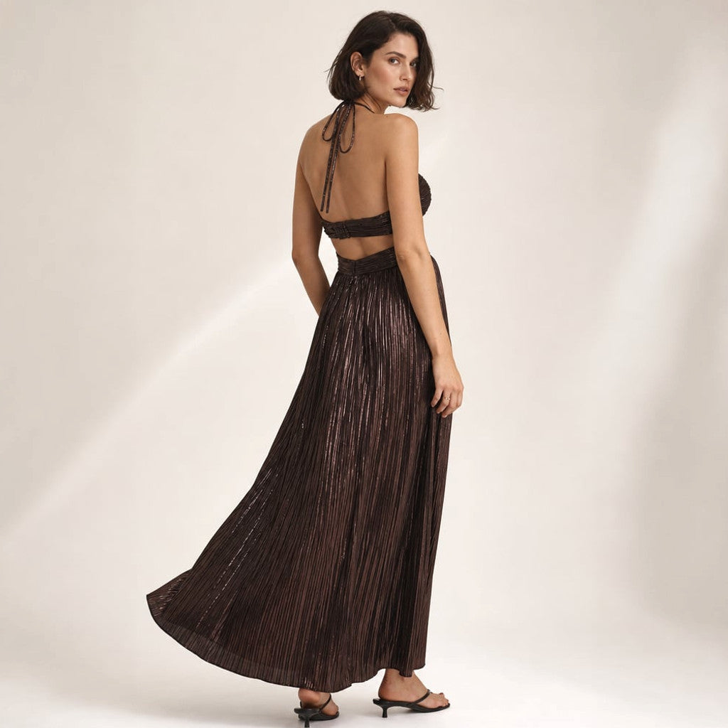 Model wearing the Saesan chocolate maxi dress with halter tie neckline and close-fitting bodice, photographed at full length