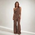 Model wearing Tasi chocolate wide-leg cotton co-ord set with asymmetric off-shoulder top